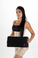 Woman in Post-Surgery Faja Holding BBL Back Support Cushion – Lumbar Pillow for BBL Recovery